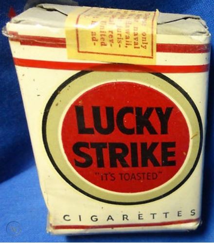 roger moore cigarette photo Sir Roger Moore: The Spy Who Smoked